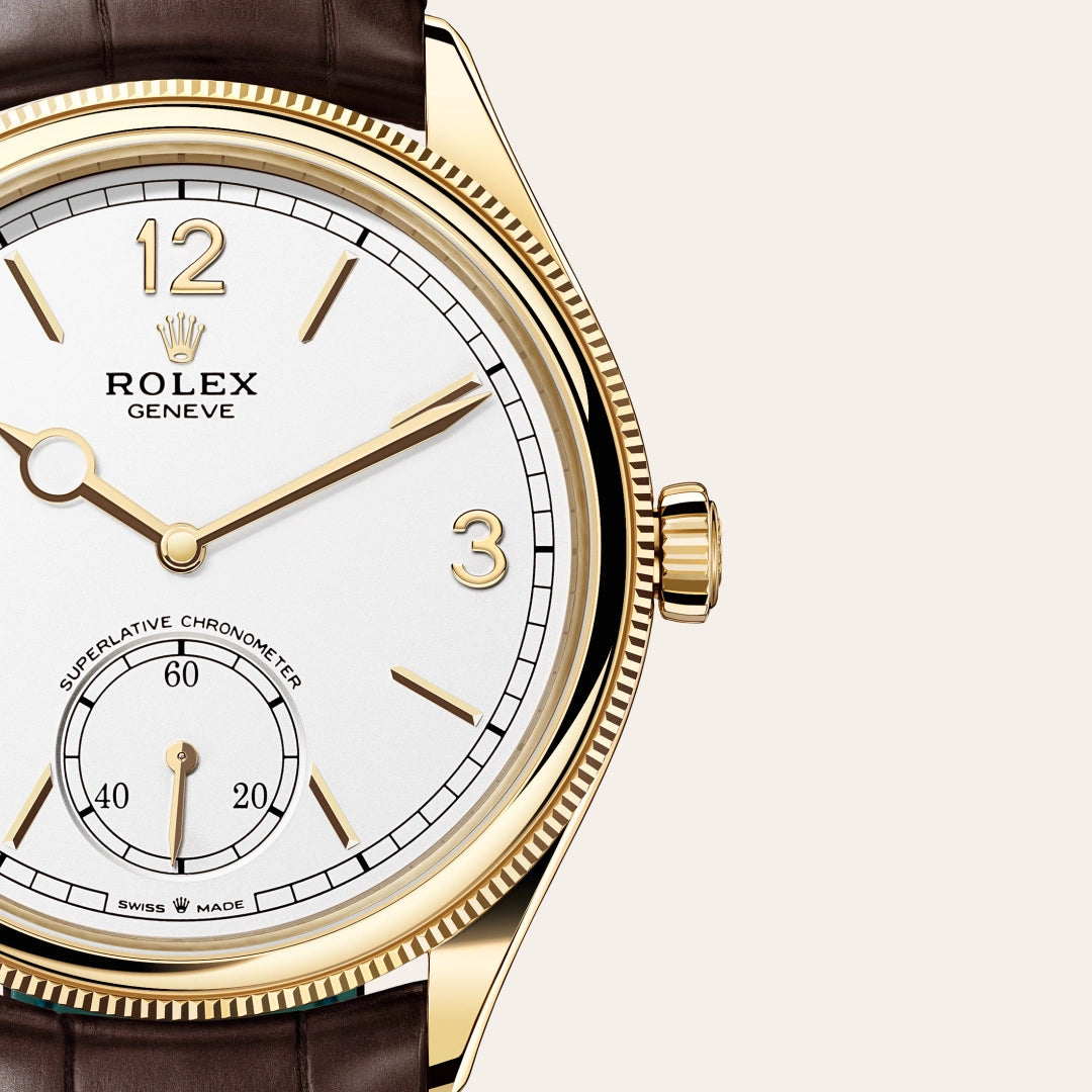 Rolex 1908 in 18 ct yellow gold with a Intense white dial, Domed and fluted bezel, Leather strap bracelet