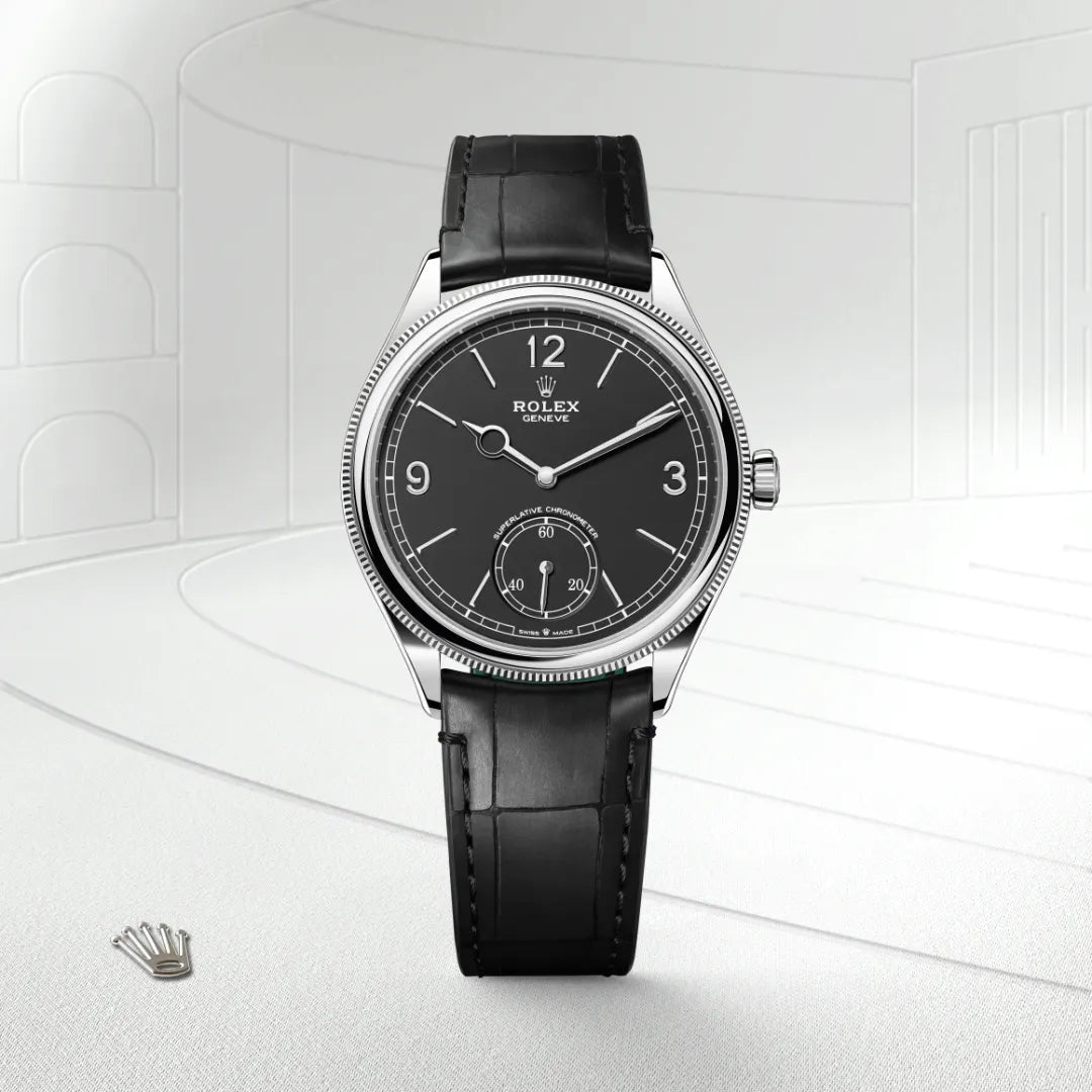 Rolex 1908 in 18 ct white gold with a Intense black dial, Domed and fluted bezel, Leather strap bracelet