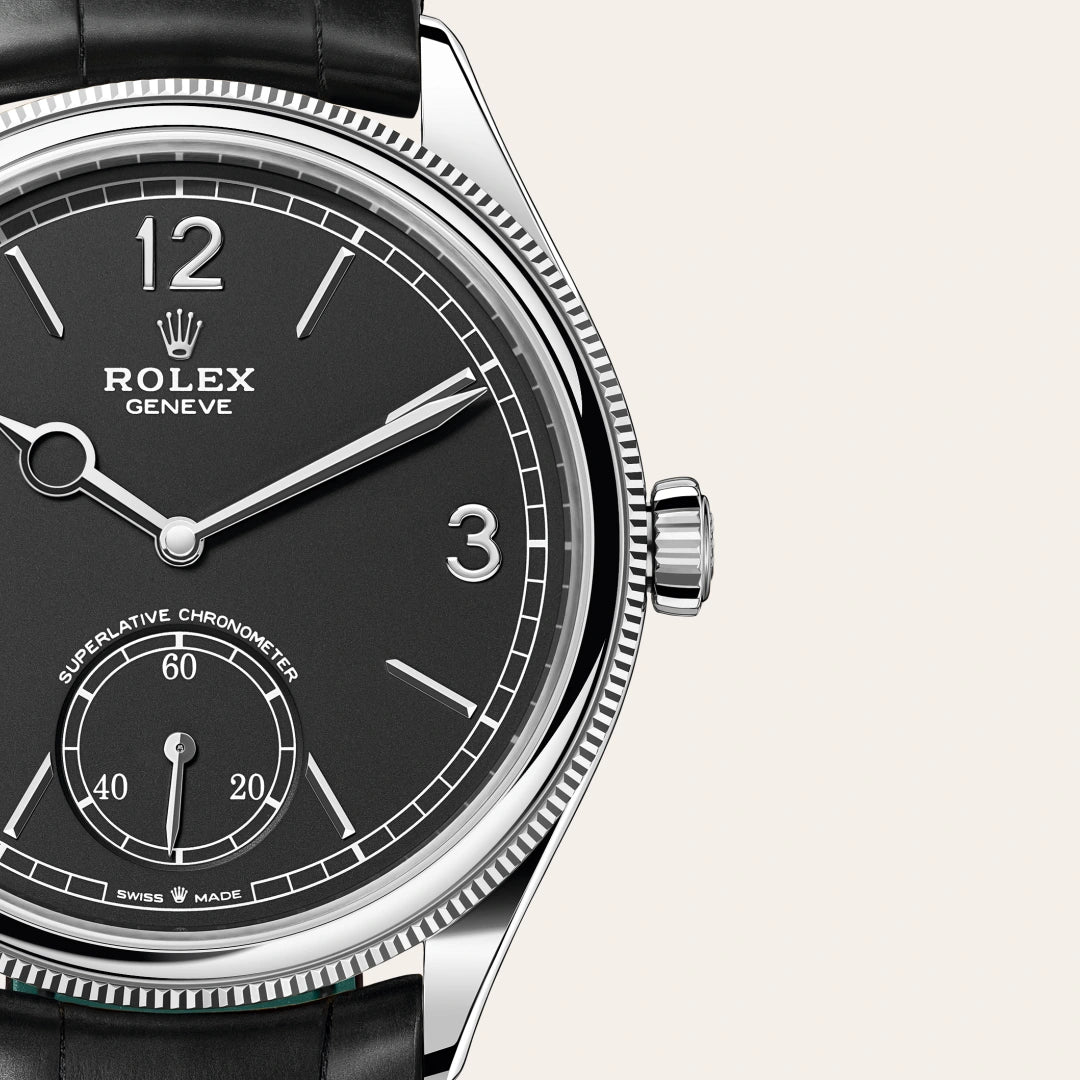 Rolex 1908 in 18 ct white gold with a Intense black dial, Domed and fluted bezel, Leather strap bracelet