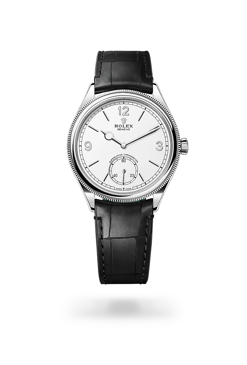 Rolex 1908 in 18 ct white gold with a Intense white dial, Domed and fluted bezel, Leather strap bracelet
