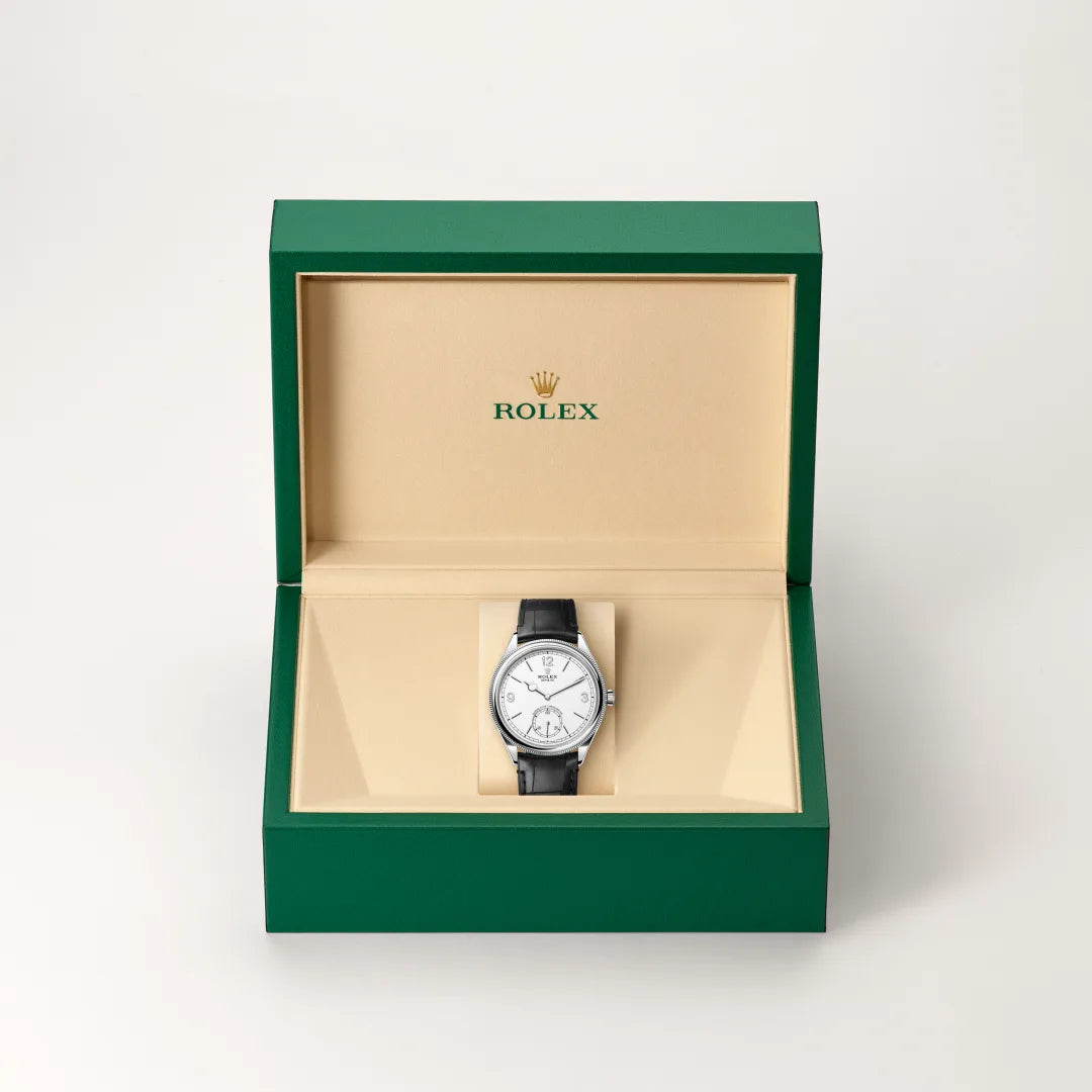 Rolex 1908 in 18 ct white gold with a Intense white dial, Domed and fluted bezel, Leather strap bracelet
